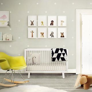 neutral nursery with star wallpaper and picture gallery