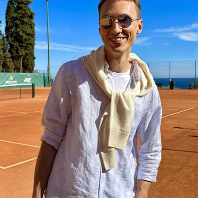 picture of interior designer Anton Liakhov playing tennis