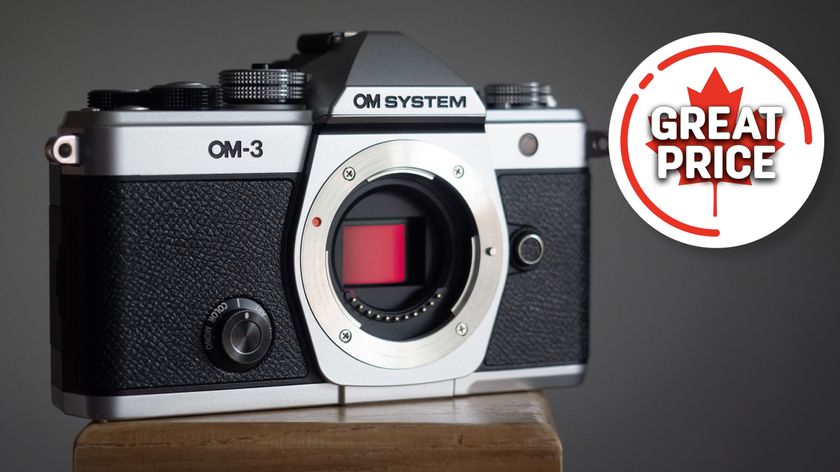 OM System OM-3 against a grey background with the text &quot;Great price&quot;