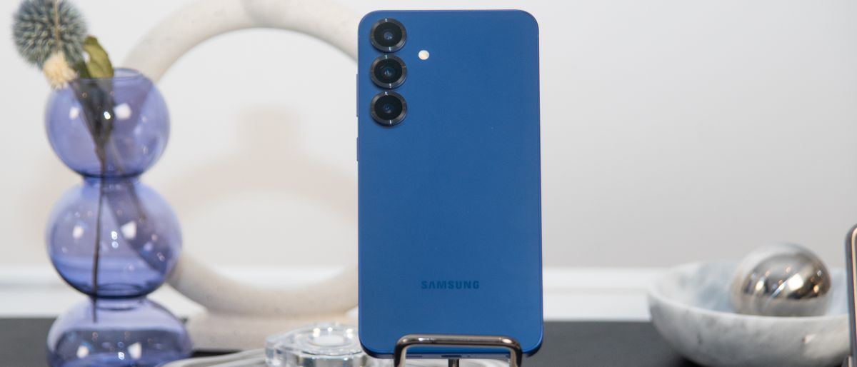 Samsung Galaxy S25 Plus on stand in blue