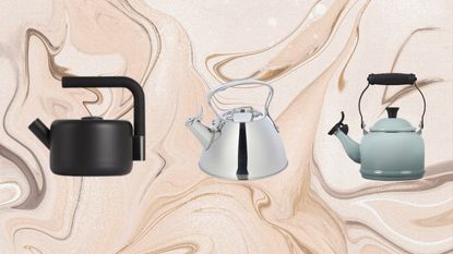 A trio of the best stovetop kettles from Fellow, All-Clad and Le Creuset on brown marbled background