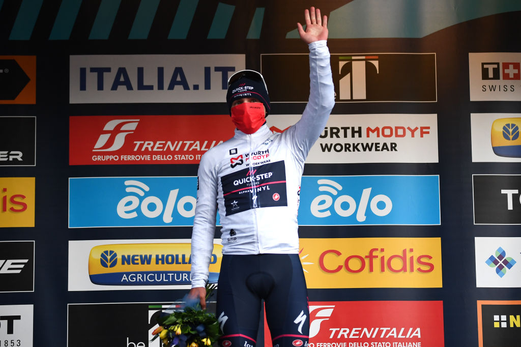 TERNI ITALY MARCH 09 Remco Evenepoel of Belgium and Team QuickStep Alpha Vinyl White Best Young Rider Jersey celebrates at podium during the 57th TirrenoAdriatico 2022 Stage 3 a 170km stage from Murlo to Terni TirrenoAdriatico WorldTour on March 09 2022 in Terni Italy Photo by Tim de WaeleGetty Images