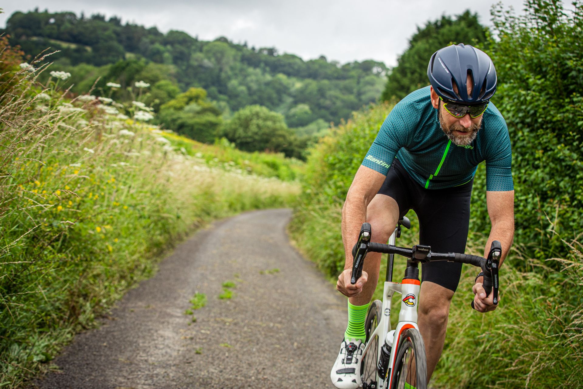 Image shows a rider exercising outdoors.