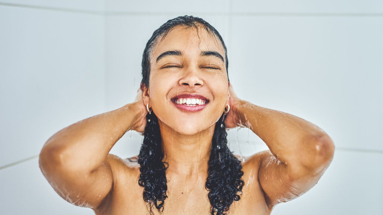 woman shampooing hair