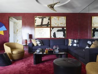 modern living room with ruby red wall to wall carpet