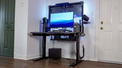 The Corsair Platform 4: Elevate Desk set up in a corner