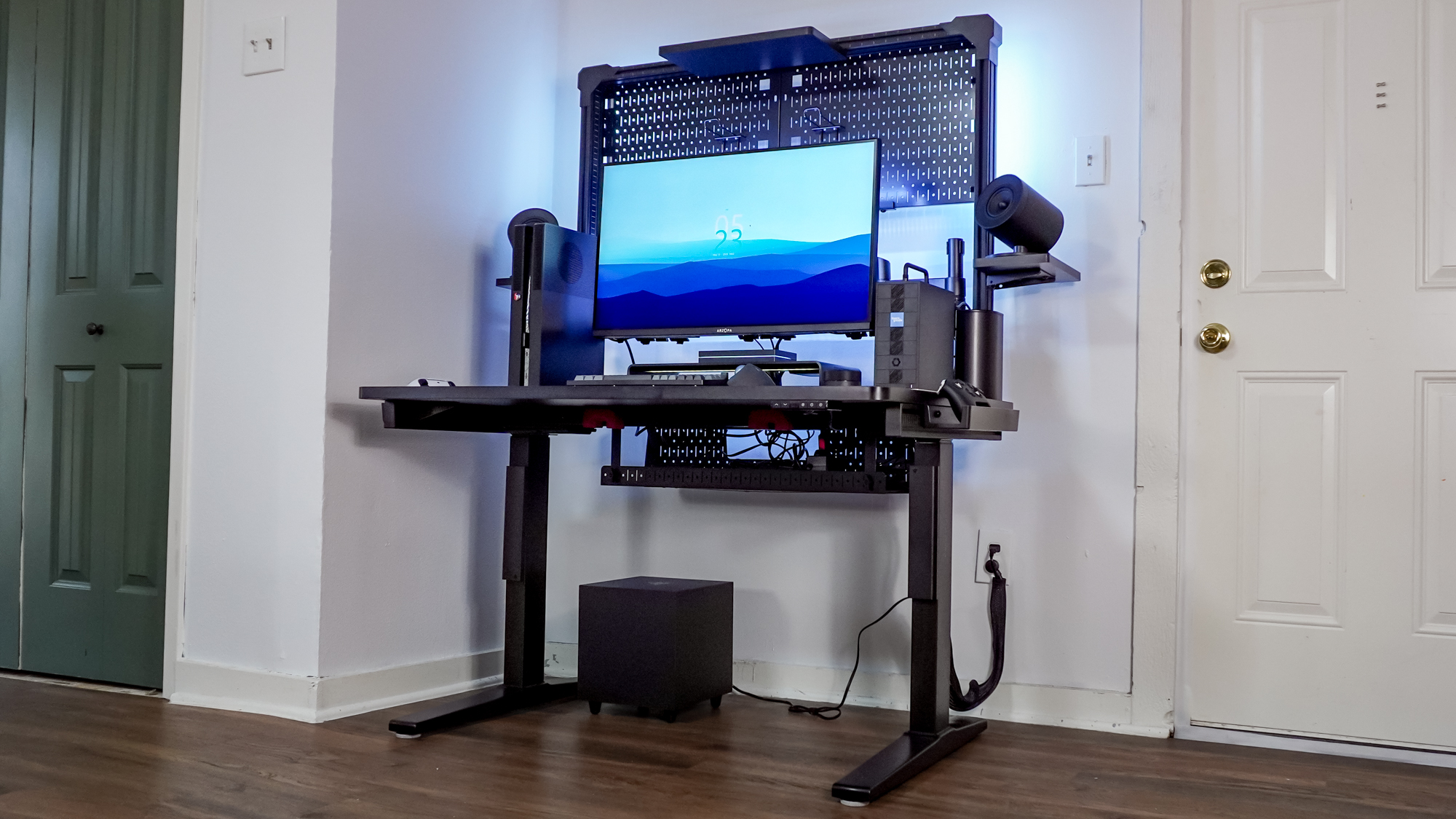 The Corsair Platform 4: Elevate Desk set up in a corner