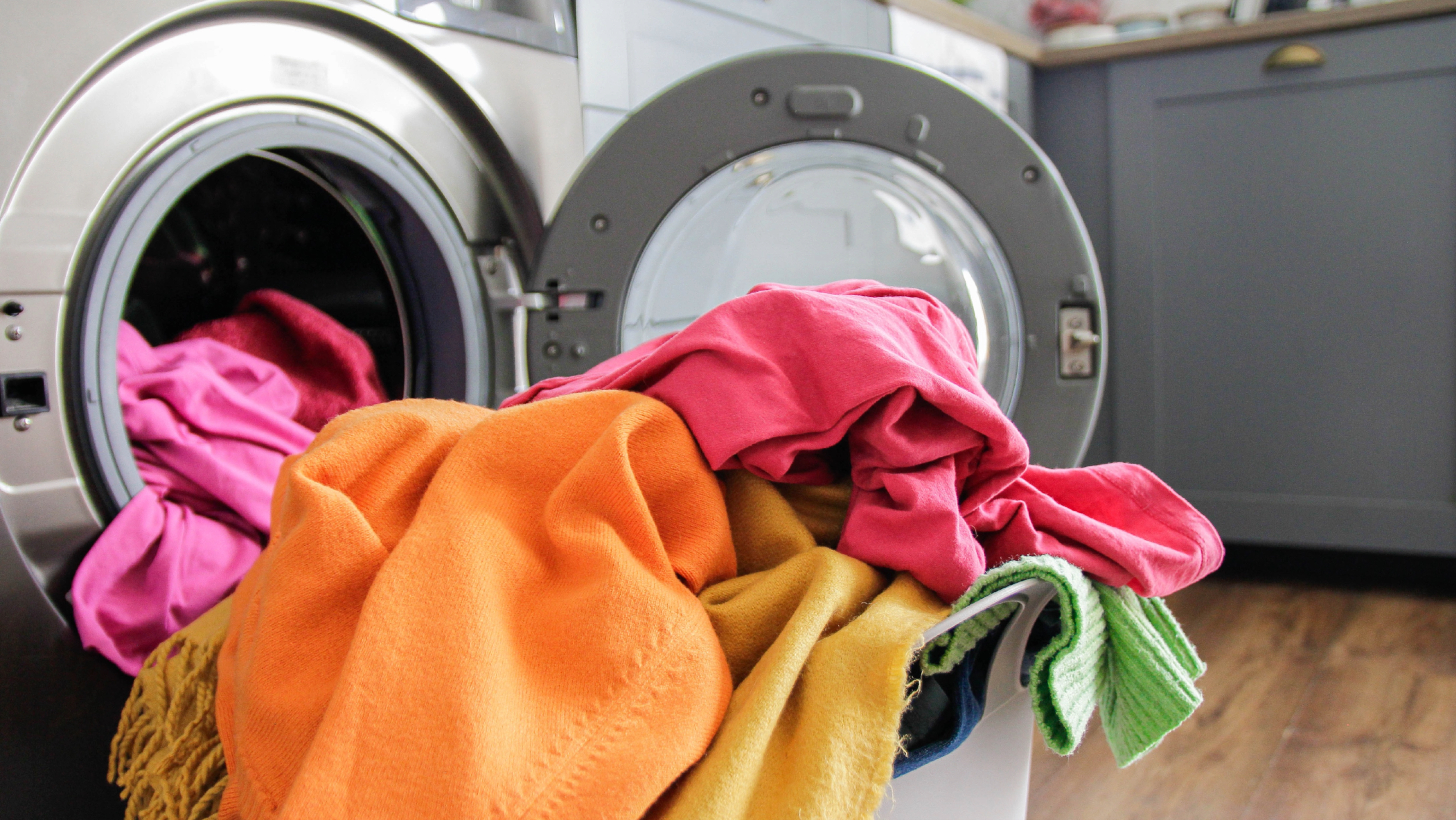Laundry basket sat by washing machine