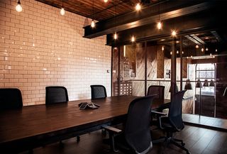 Meeting rooms have been kitted out with tiled walls and atmospheric lighting