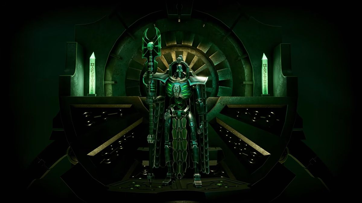 In-game screenshot of Trazyn the Infinite, a metallic, skeletal figure standing menacingly in front of a throne in a dark room lit by green lights. The mood is grim, dark, and threatening.
