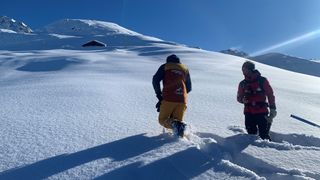 Two skiers doing avalanche training in Verbier