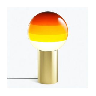 table lamp with gold base, round bulb with white, yellow and orange stripes