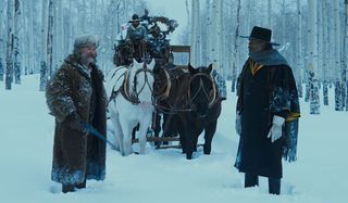 The Hateful Eight Kurt Russell chats with Samuel L. Jackson in the snow