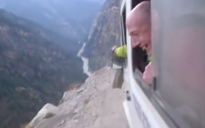 Don't watch this car drive on a Himalayan mountainside if you're afraid of heights