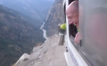Don't watch this car drive on a Himalayan mountainside if you're afraid of heights