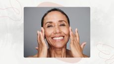 Woman smiling and touching the sides of her face, on a white marble background with pink motifs and swirls