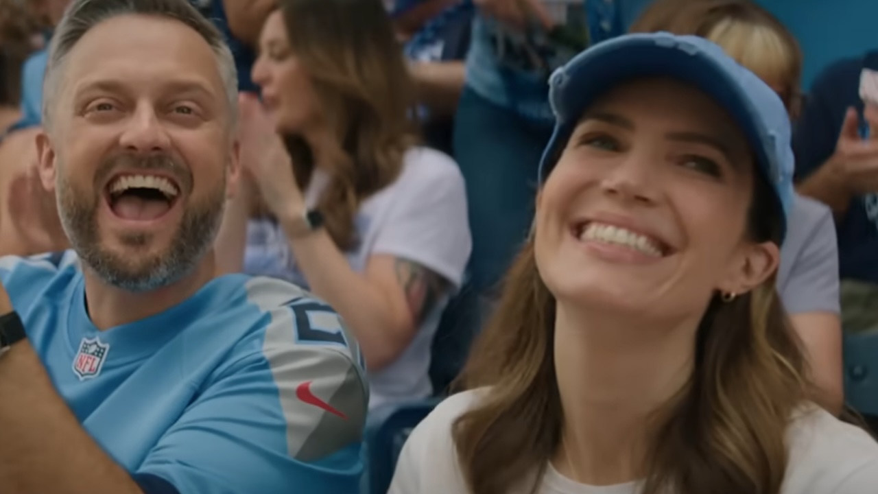 Nate Bargatze and Mandy Moore smiling brightly in The Breadwinner