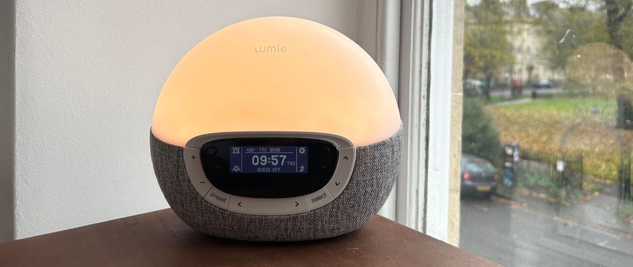 The Lumie Bodyclock Shine 300 on a bedside table