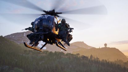A helicopter of soldiers flies above a forest in Wardogs