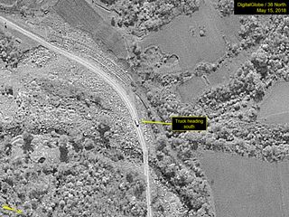 A large truck was observed on the access road between the Guard Barracks and Southern Support Area on May 15, 2018, at the Punggye-ri site in North Korea.