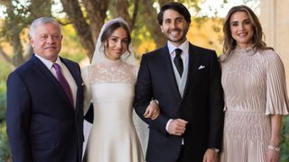 King of Jordan Abdullah II (L), Princess Iman (2nd L), Jameel Alexander Thermiotis (2nd R) and Queen Rania (R) pose for a photo at the Royal Wedding of Princess Iman Bint Abdullah II and Jameel Alexander Thermiotis on March 12, 2023
