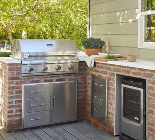 outdoor grill with brick surround