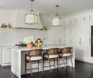 White kitchen with a statement range cooker hood