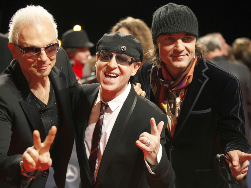 Rudolf Schenker, Klaus Meine and Matthias Jabs contemplate bridge and shuffleboard