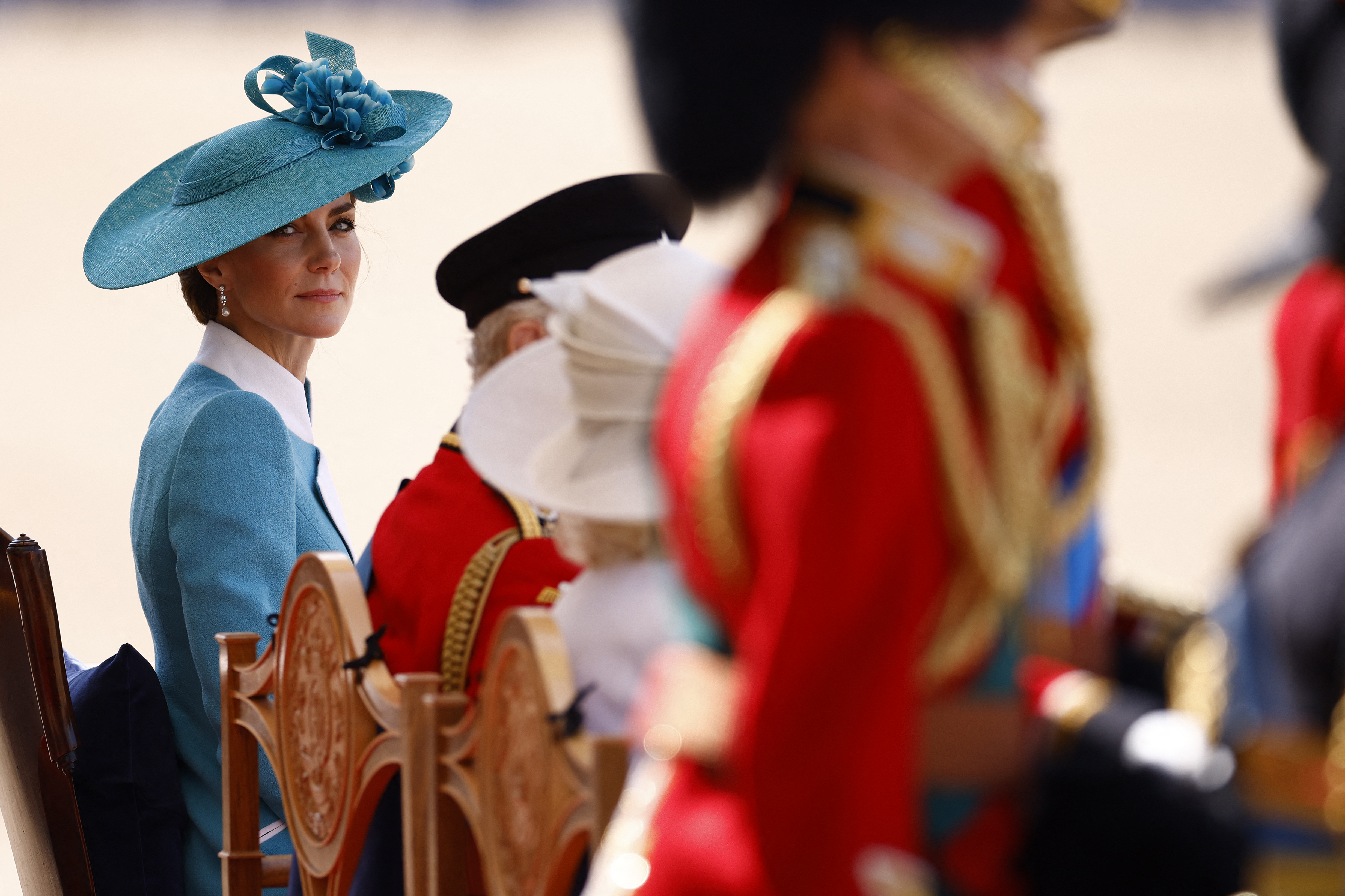 The Royal Family attends Trooping the Colour, and Kate Middleton wears an aquamarine coat dress