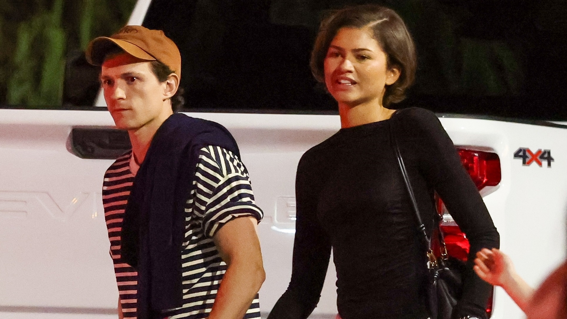 Zendaya and Tom Holland were spotted in color coordinating outfits, plus flats and Adidas Sambas sneakers respectively
