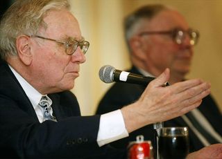 Close up of Warren Buffett speaking in mic