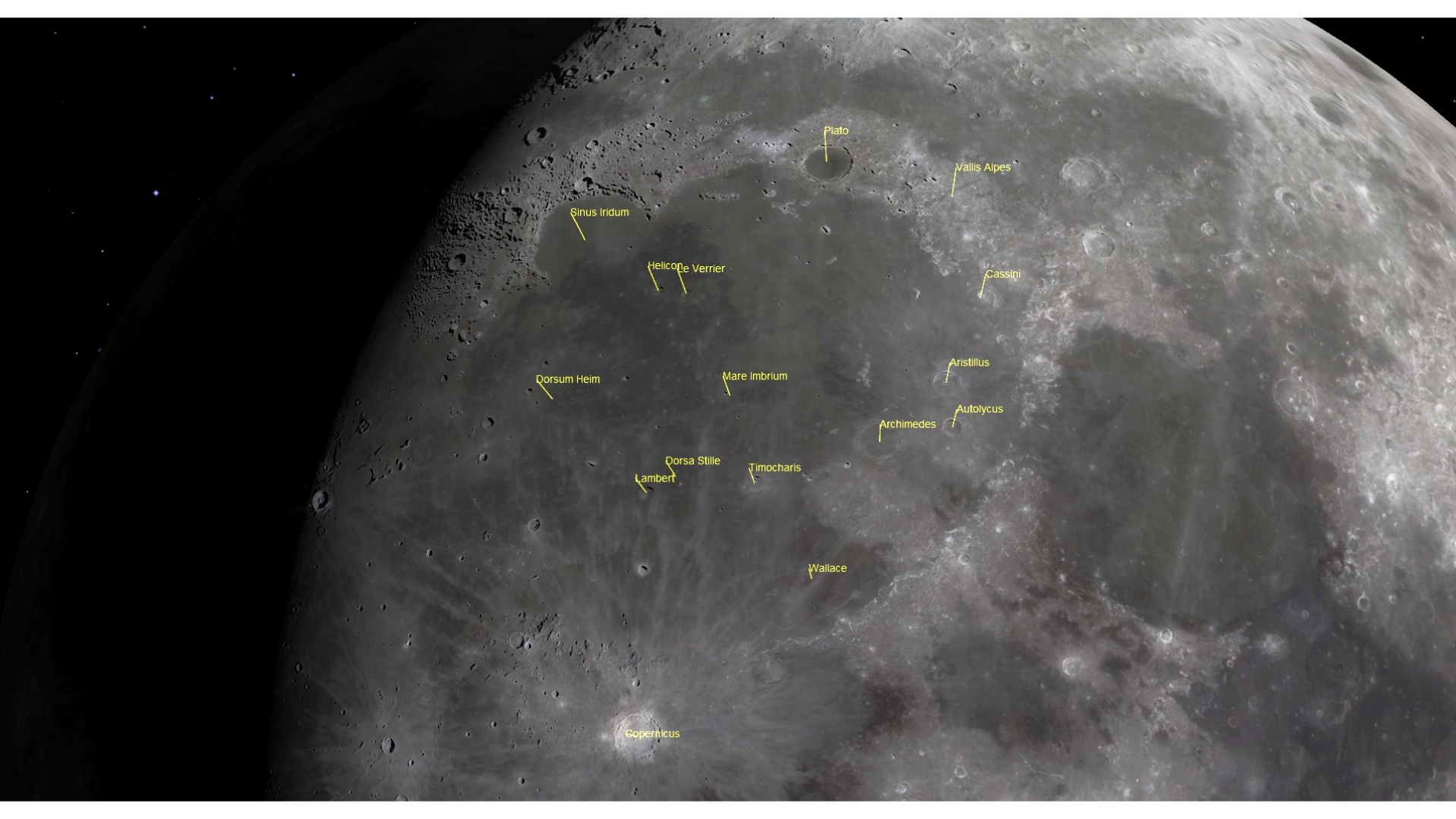 A close up of the moon&#039;s surface from space showing yellow labeled areas including Mare Imbrium