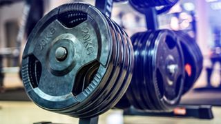 Stacked weight plates at a gym