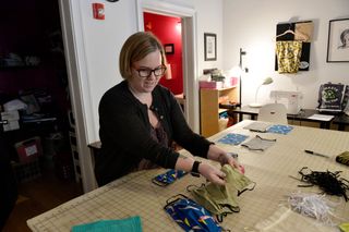 Stephanie Cave has sewn masks for hospital workers at a site called Stitch House in in Dorchester, Massachusetts. With a huge shortage of mask at local hospitals for nurses and doctors, many hospitals have put out calls for donations, Stitch House and their volunteers hope to make close to 1,000 mask to donate. Evidence suggests these sorts of masks offer limited protection against the virus. This photo was taken on March 22, 2020.