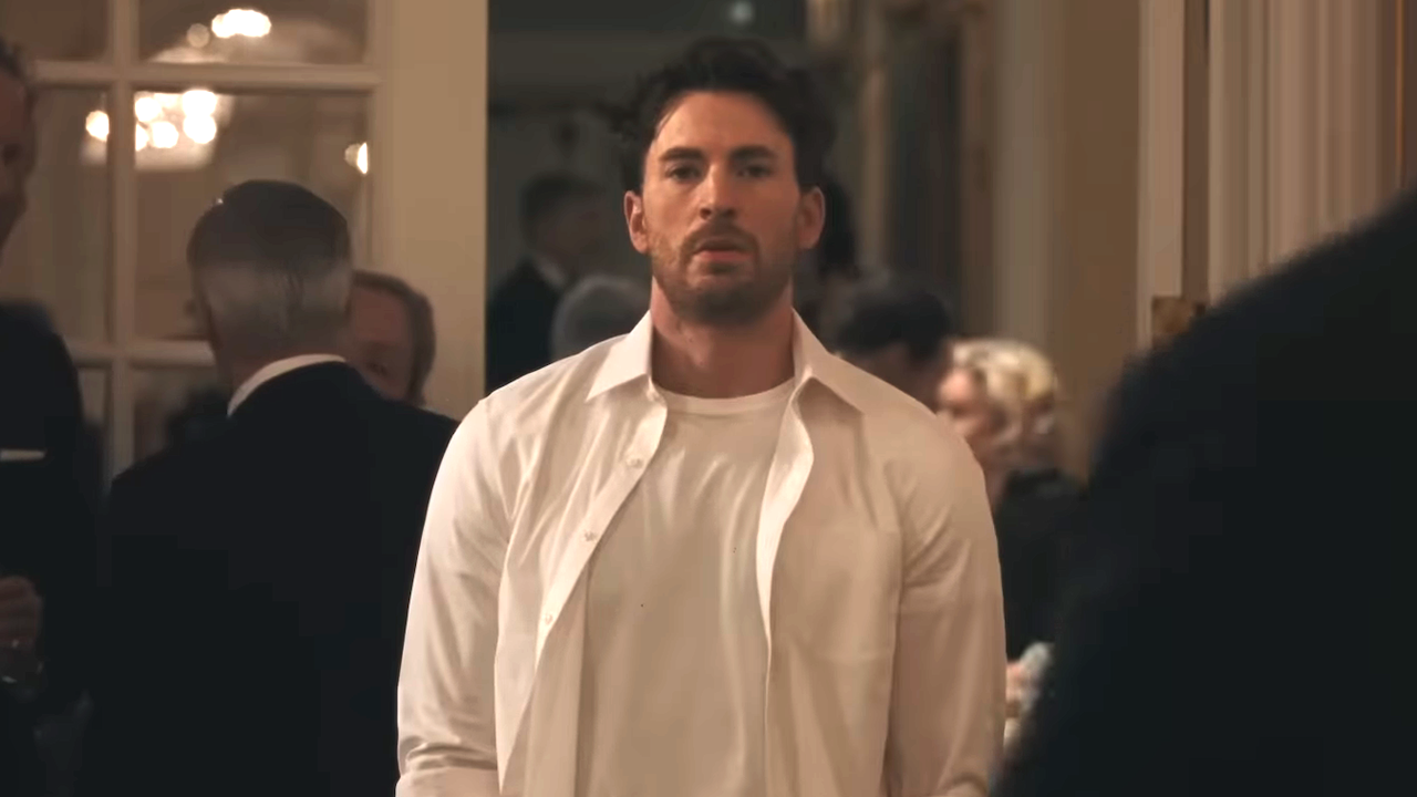 Chris Evans in a white button up in Materialists