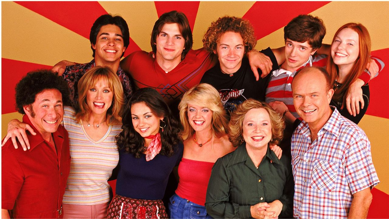 Where to watch That &#039;70s Show? Pictured: Top row L-R: Wilmer Valderrama, Ashton Kutcher, Danny Masterson, Topher Grace, Laura Prepon. Center L-R: Don Stark, Tanya Roberts, Mila Kunis, Lisa Robin Kelly, Debra Jo Rupp, Kurtwood Smith.