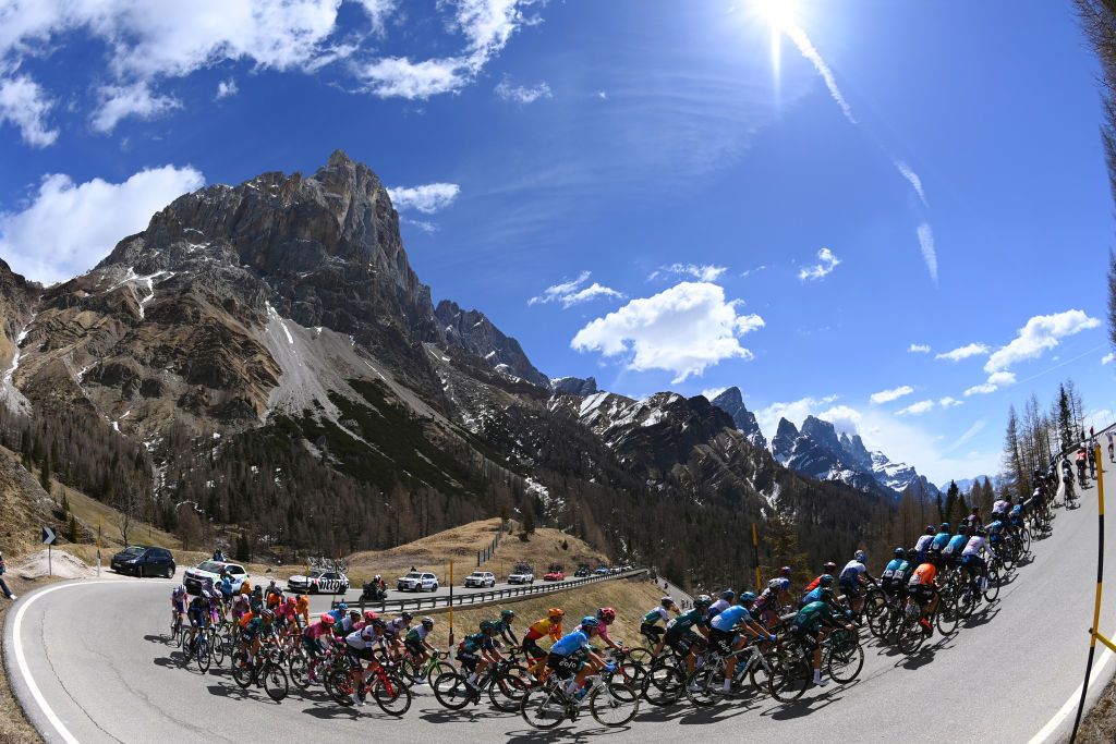 BOLZANO LANA ITALY APRIL 19 A general view of the Peloton passing through Passo Rolle 1973m during the 45th Tour of the Alps 2022 Stage 2 a 1541km stage from PrimieroS Martino di Castrozza to Lana TouroftheAlps on April 19 2022 in Bolzano Lana Italy Photo by Tim de WaeleGetty Images