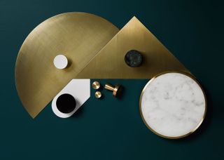 Stainless steel and bronze accents merge with unusual marble shades