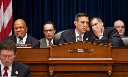 Darrell Issa, R-Ca. (center) confers with committee general counsel Stephen Castor (right), during the hearing on Benghazi, May 8.