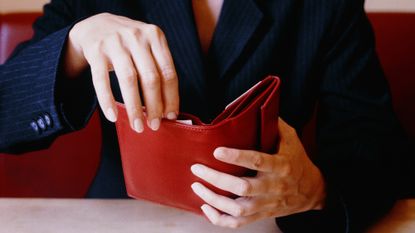 Woman holding wallet