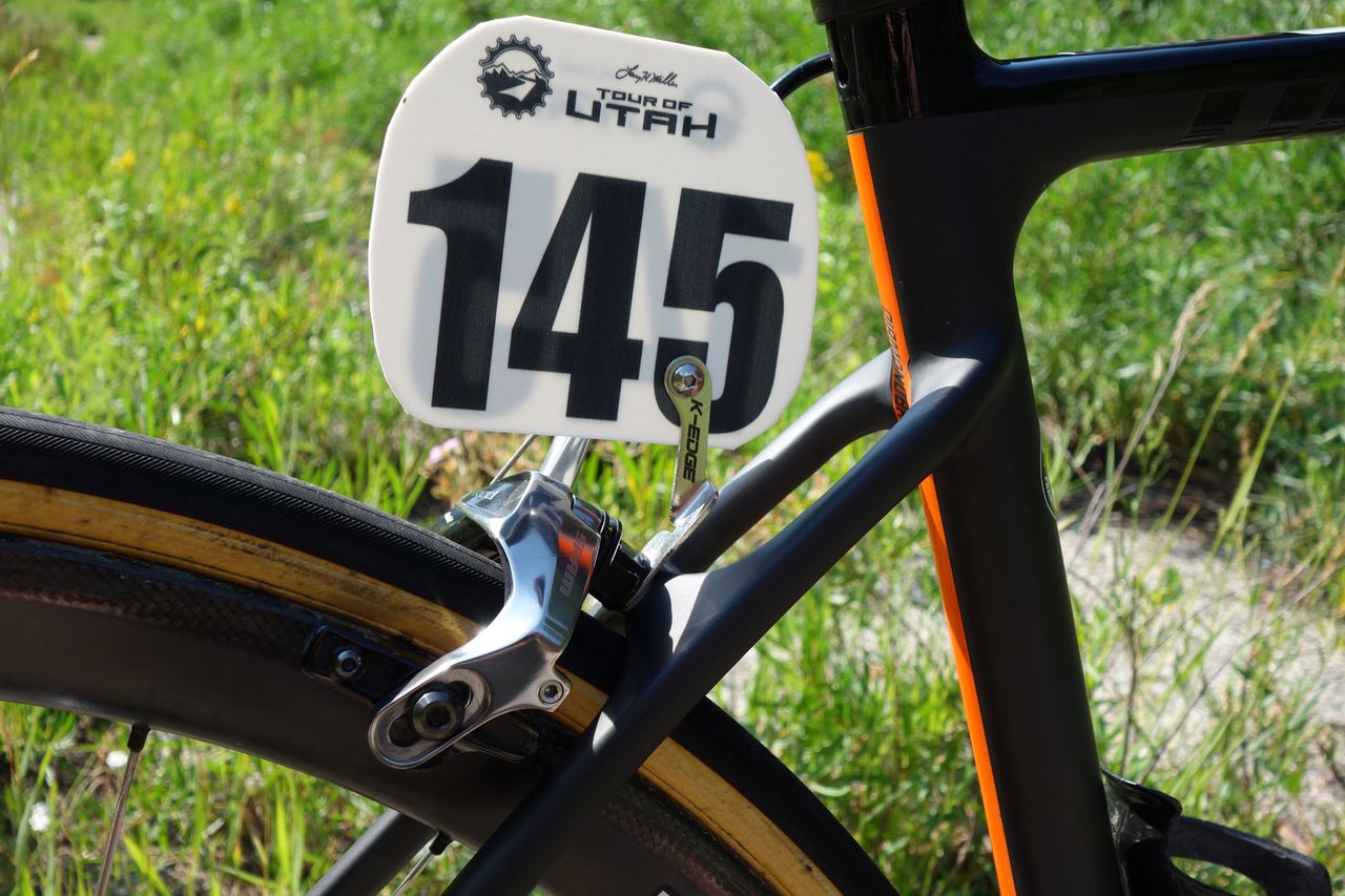 A tightly trimmed race number and K-Edge holder are nice details from the team&rsquo;s mechanics.