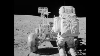 Astronaut John Young and the Lunar Roving Vehicle seen in 1972, during the Apollo 16 mission that marked the last time NASA landed humans on the moon.