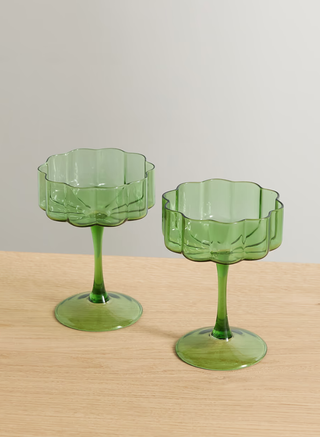 green glass coupes with a wavy rim