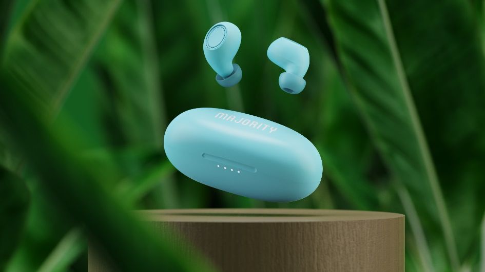 Majority Tru Bio earbuds in blue against a plant background