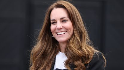 Kate Middleton Duchess of Cambridge smiles as she meets local fishermen and their families to hear about the work of fishing communities with Prince William, Duke of Cambridge