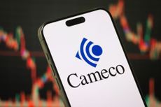 Mining stock Cameco's logo displayed on a smartphone screen