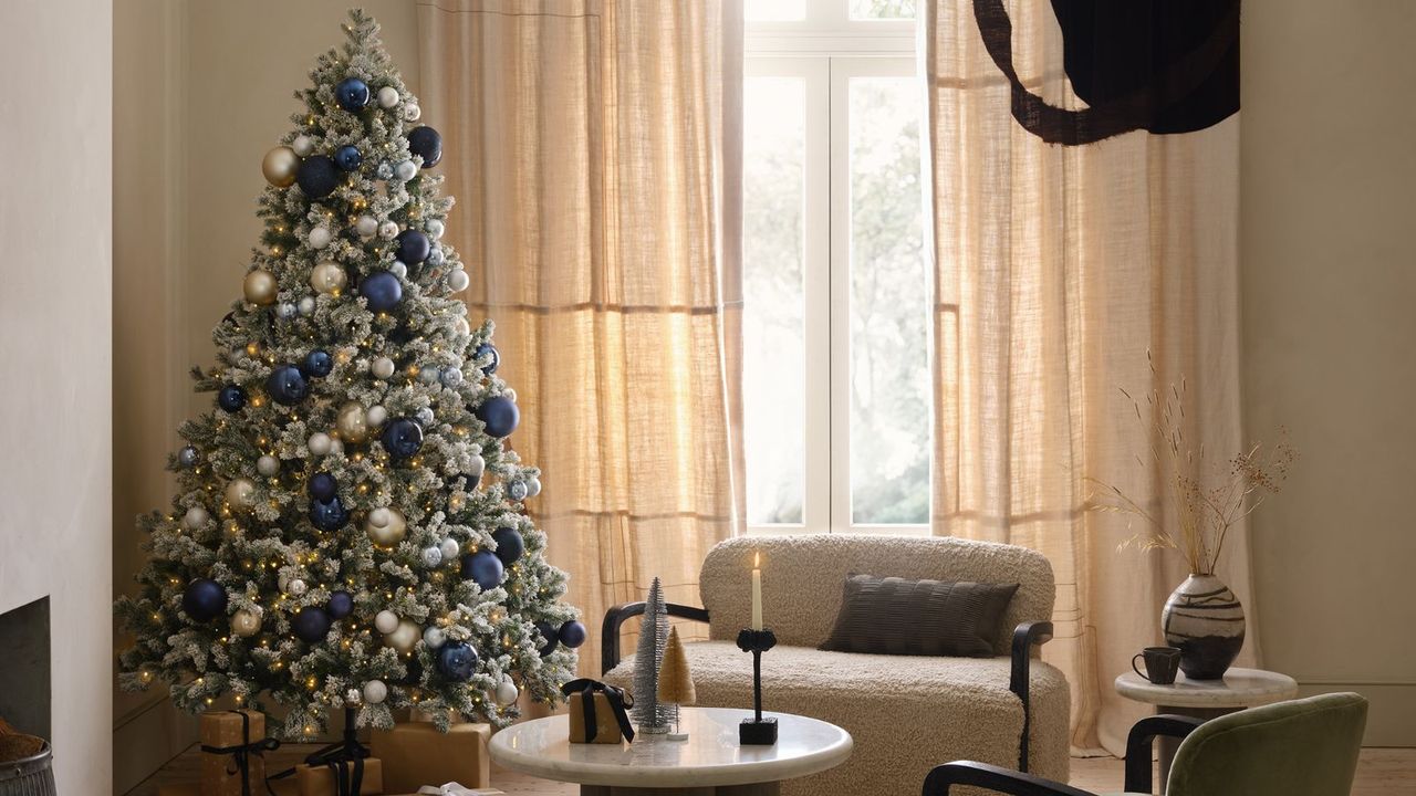 White Christmas tree in white living room