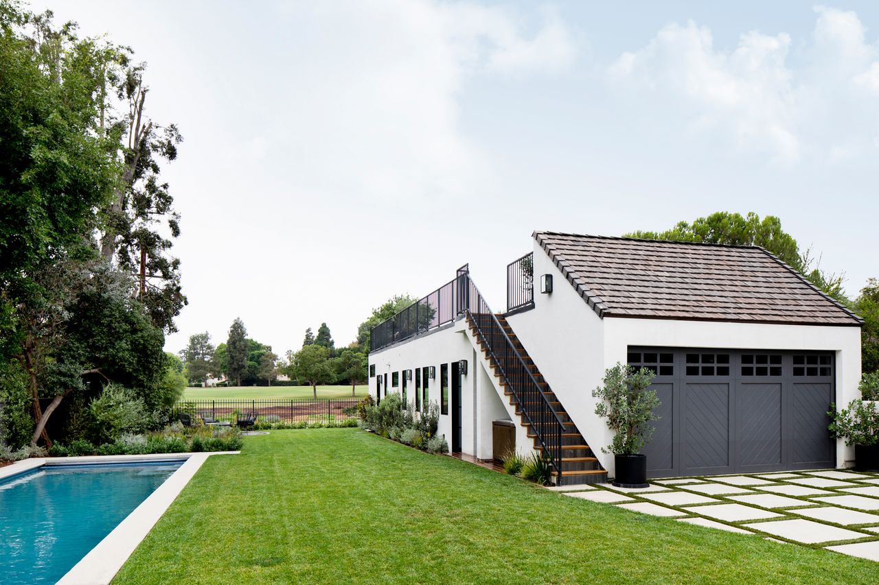 Modern home with English Tudor Revival interiors