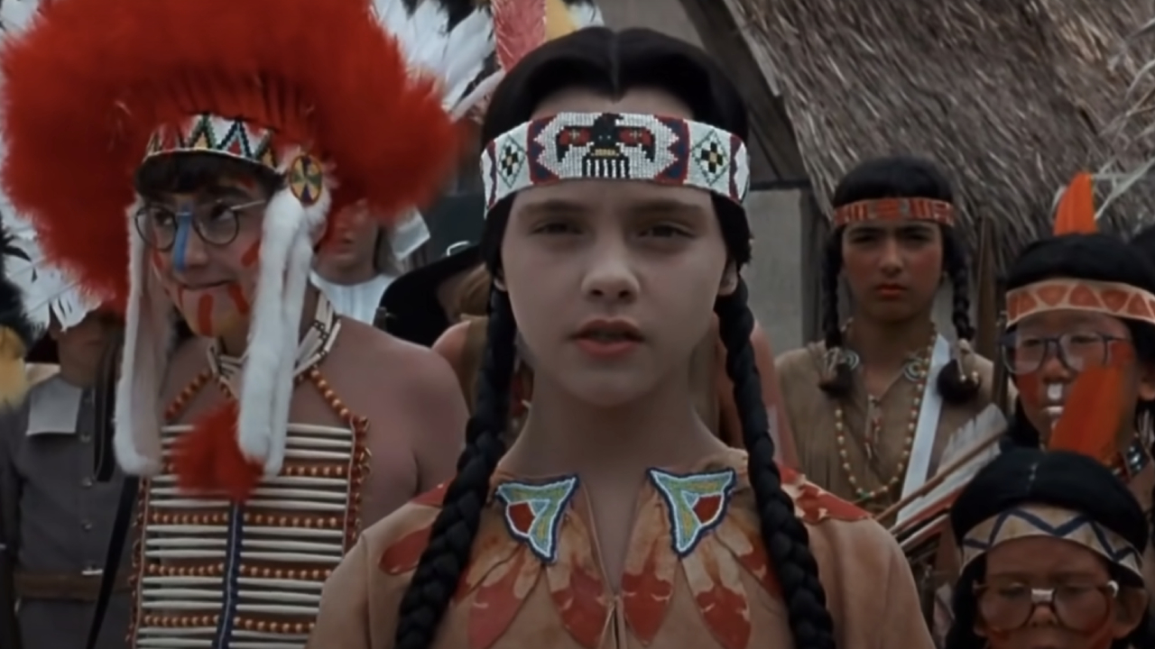 Christina Ricci as Wednesday playing Pocahontas in Addams Family Values