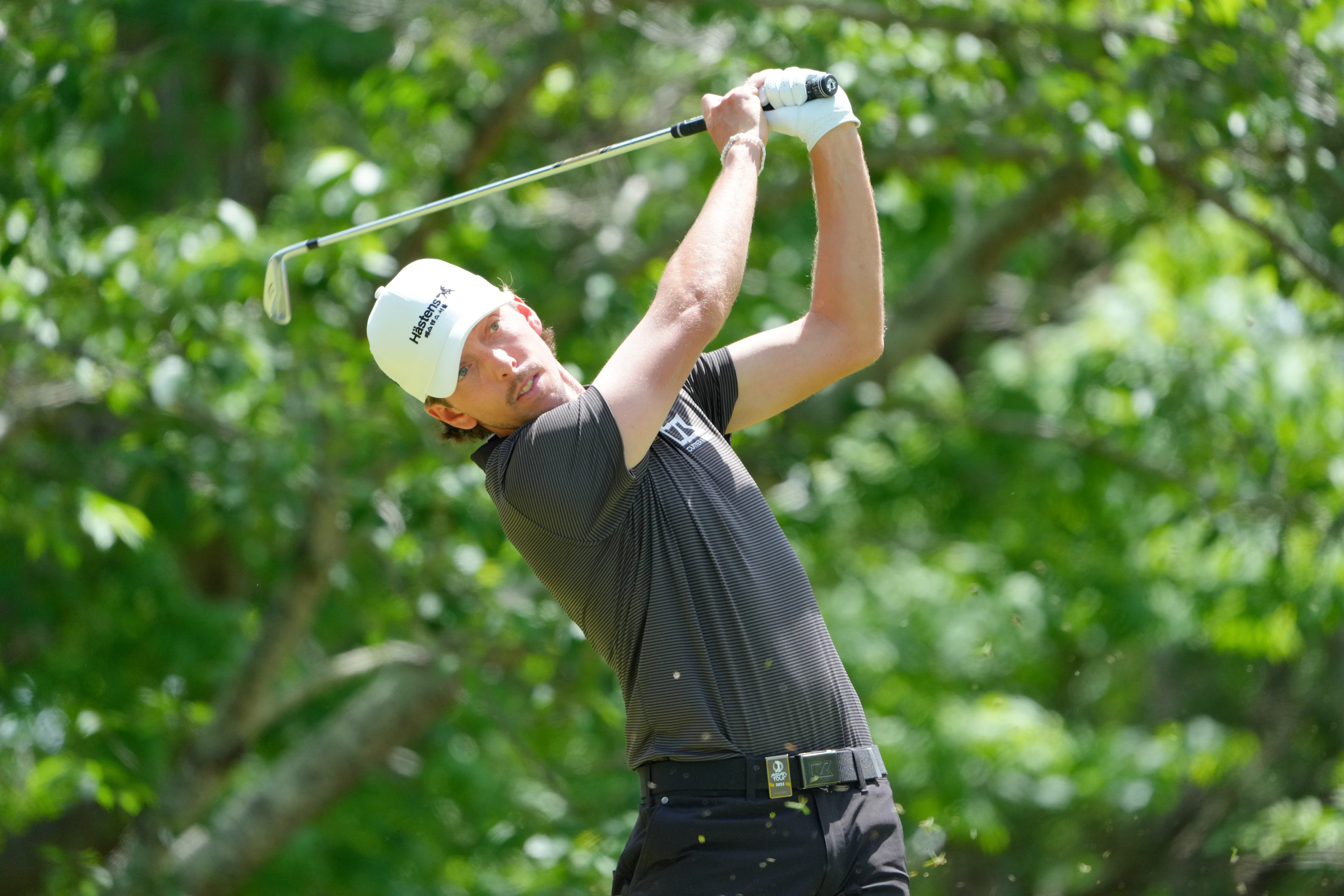 Bjorn Hellgren hits an iron shot